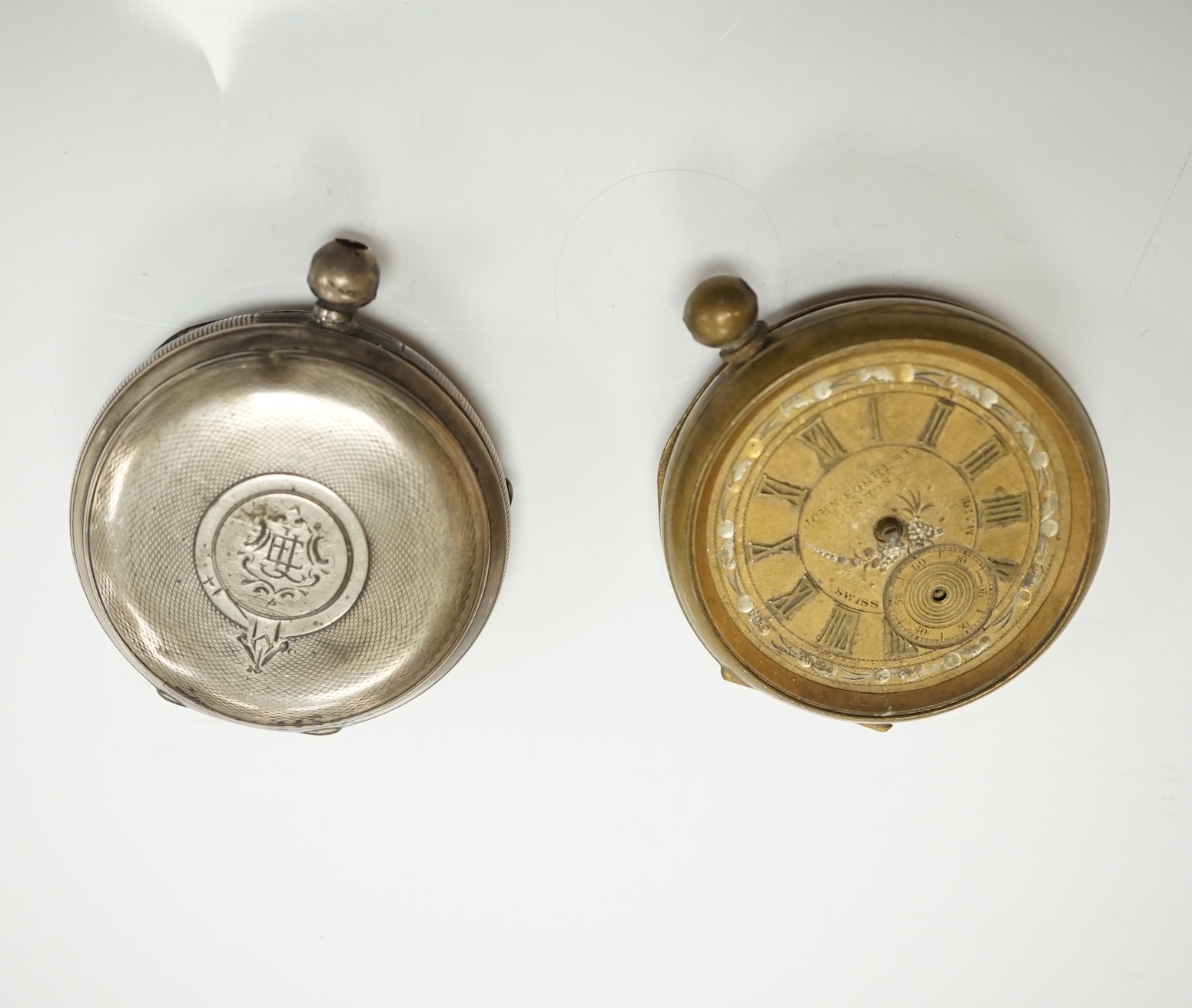 A collection of pocket watch cases (some silver), movements, dials and parts. Condition - poor